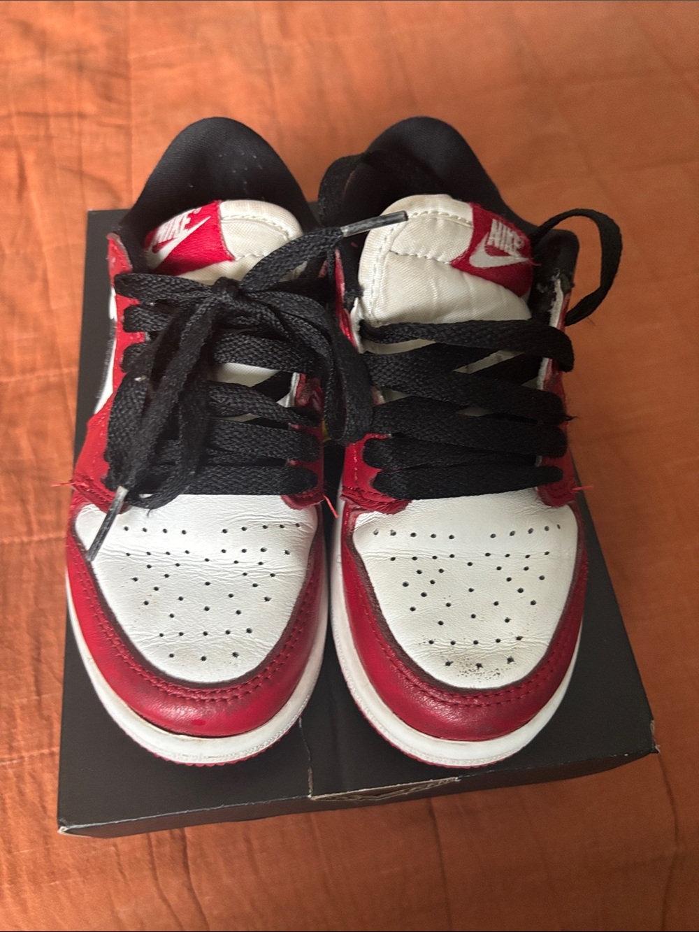 Jordan Nike Kids Low-Top Sneakers in White and Red with Black Accents